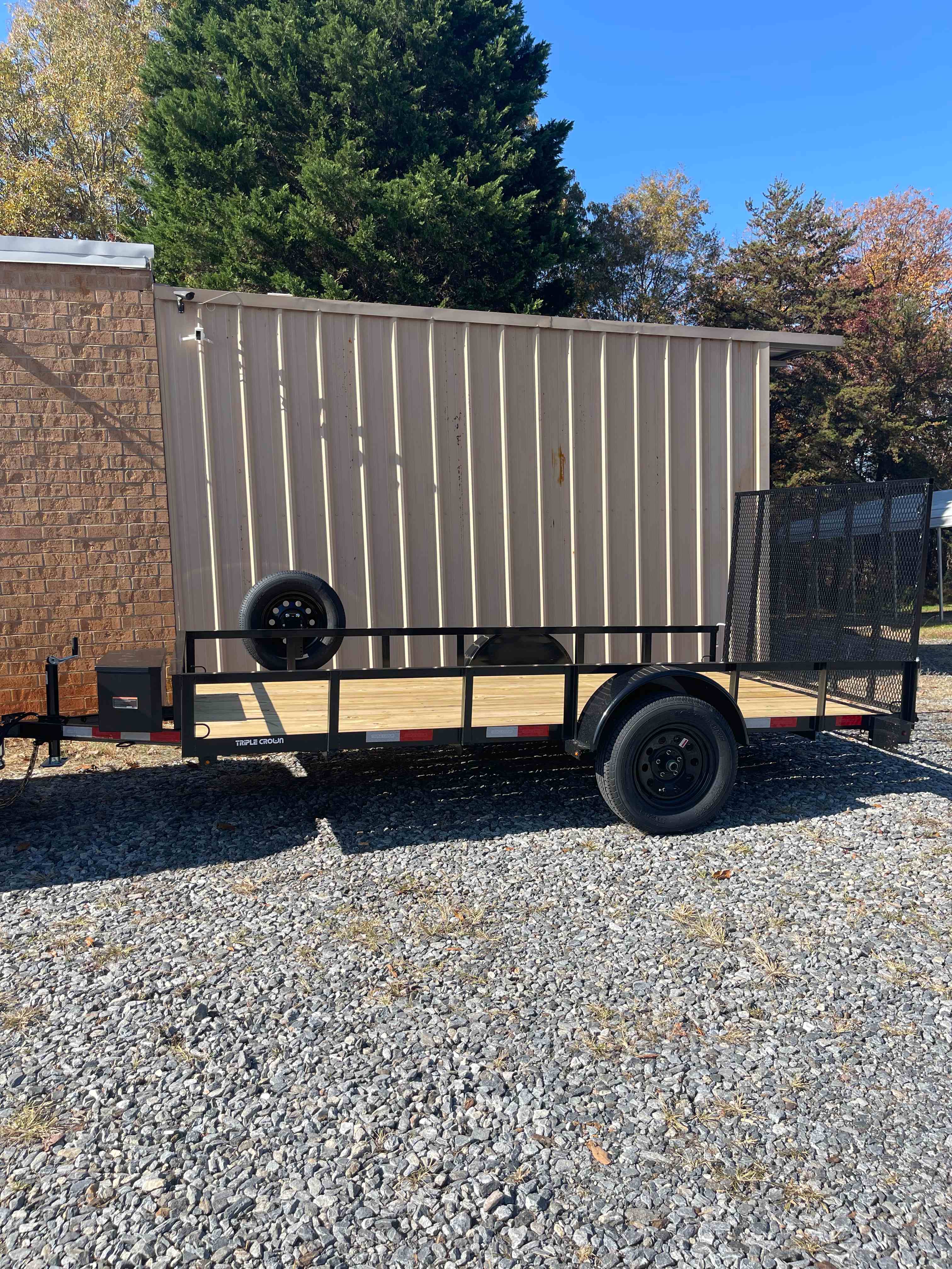 Utility Trailer Rental Gastonia NC - Compact 6x12 utility trailer with mesh sides for moving and hauling